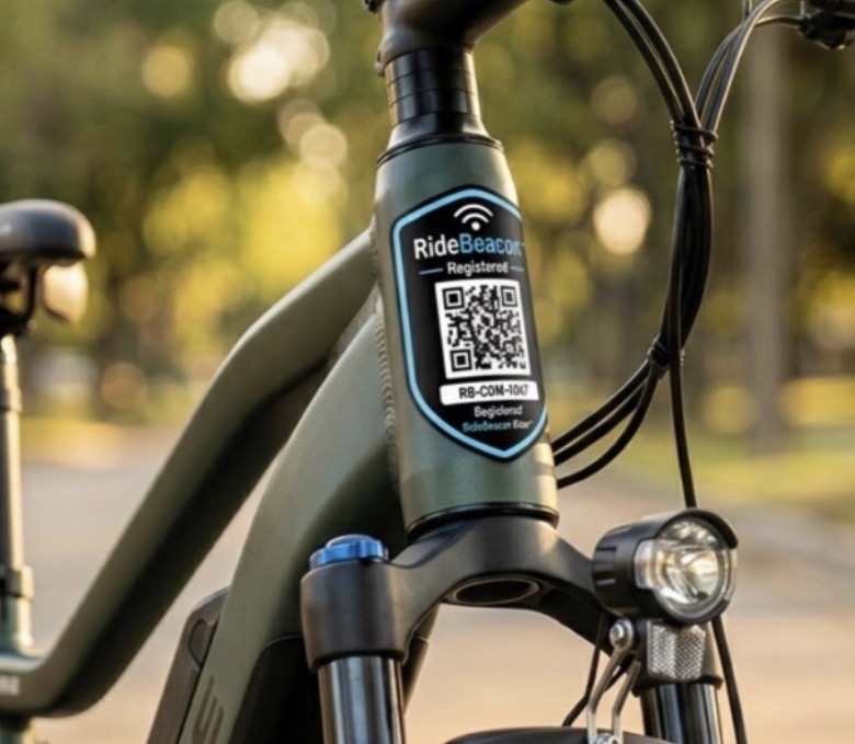 The official RideBeacon Badge — a matte black QR shield